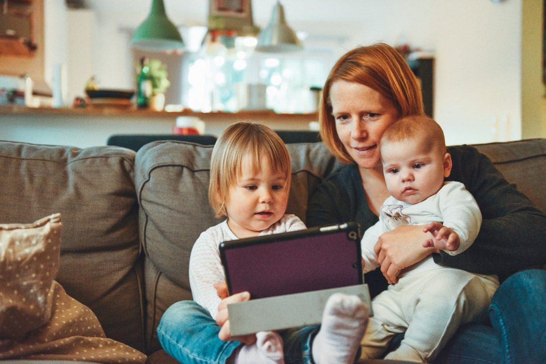 Mother at home with her children